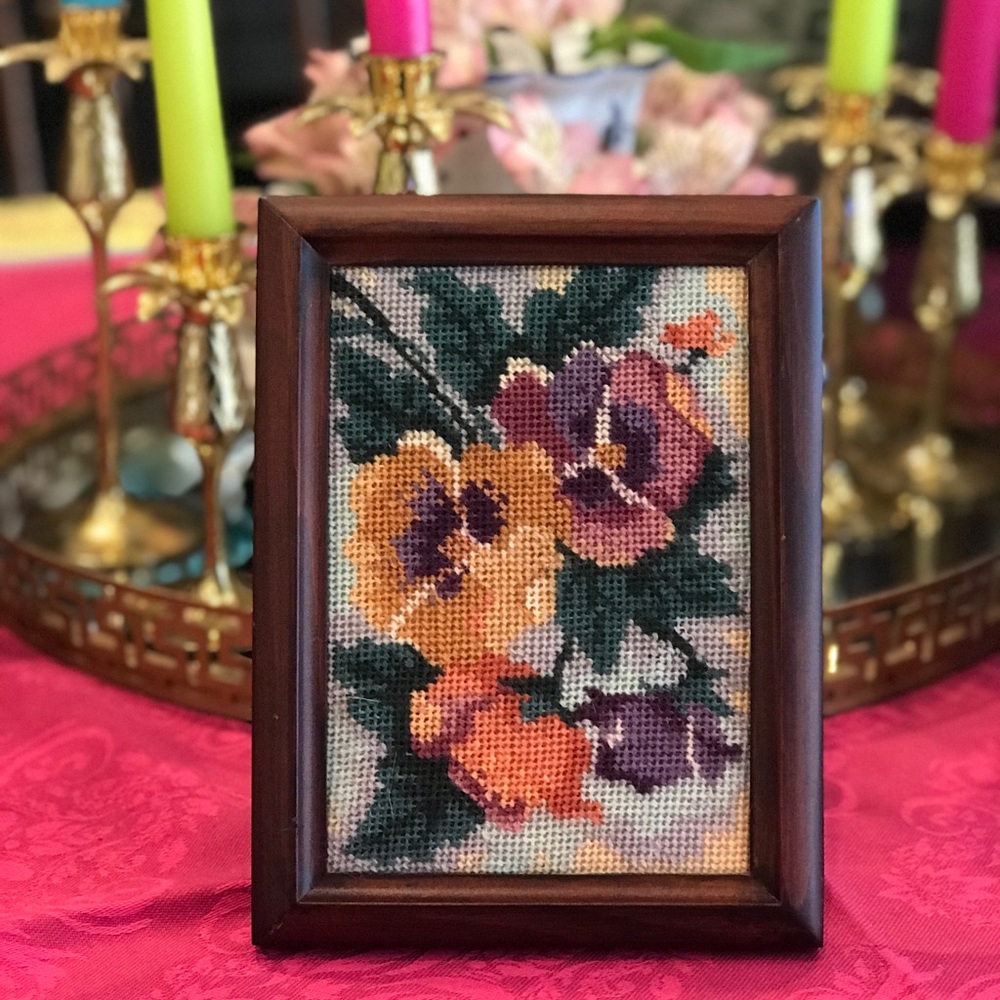 Framed needlepoint pansy artwork
